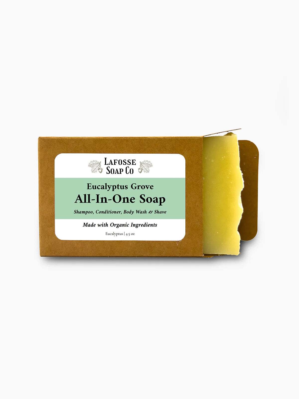 Eucalyptus Grove All-in-One Soap bar in kraft paper box with eucalyptus leaves background