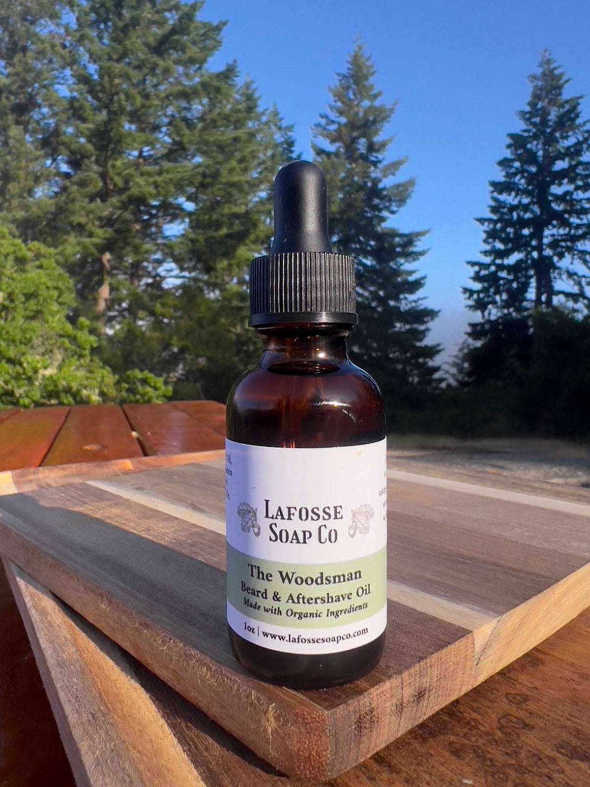 The Woodsman Beard & Aftershave Oil bottle with natural ingredients for hydration and soothing post-shave care