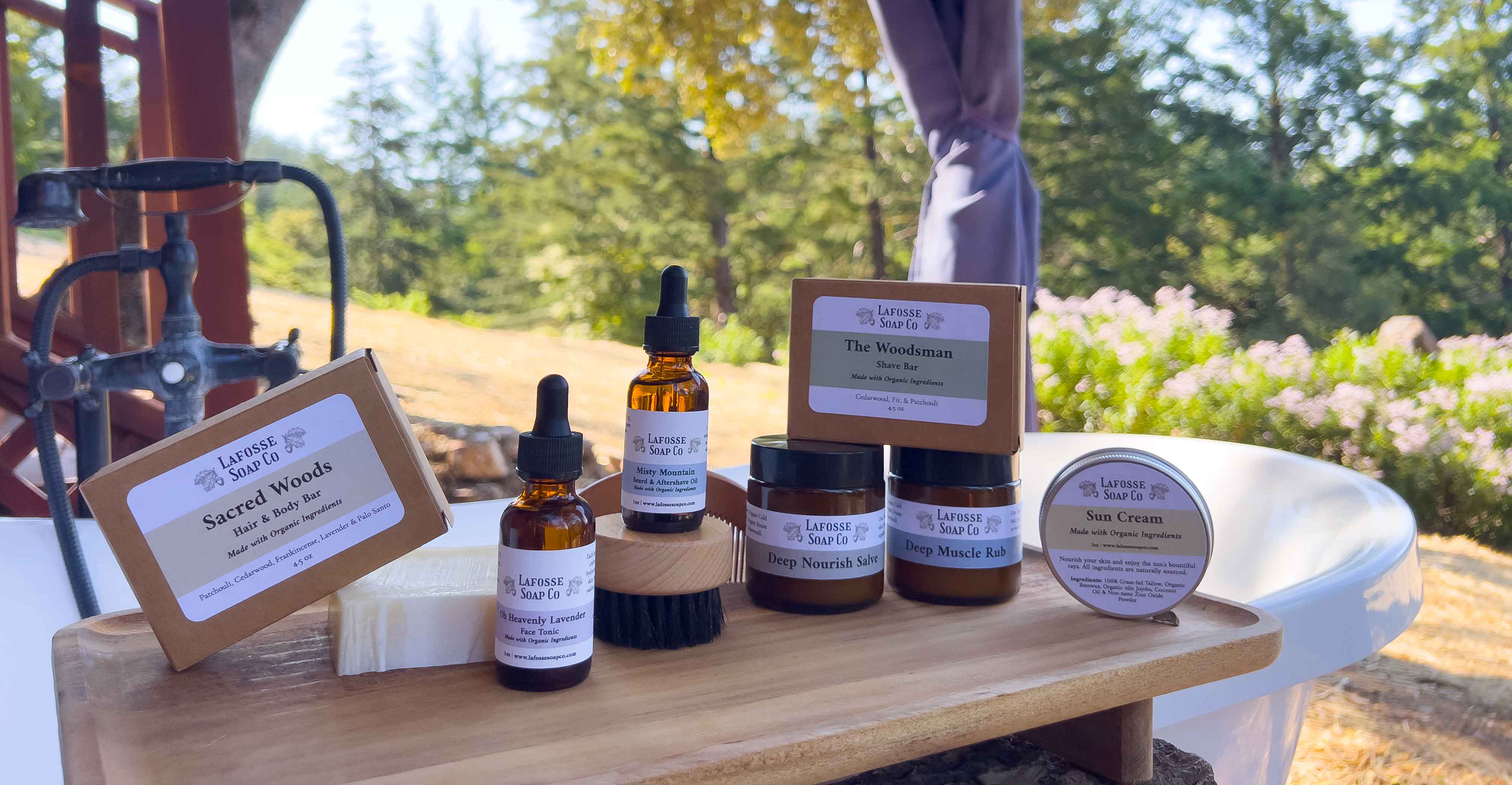 Collection of natural skincare products on a wooden surface with a garden background