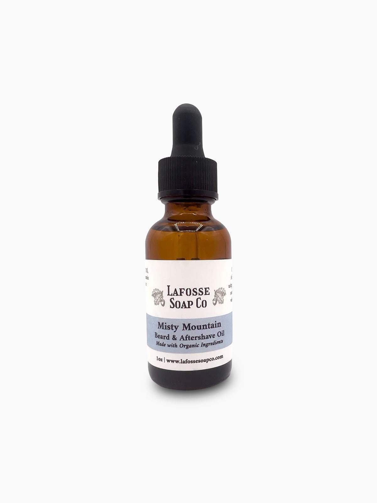 Bottle of Misty Mountain Beard & Aftershave Oil with natural ingredients on a wooden surface