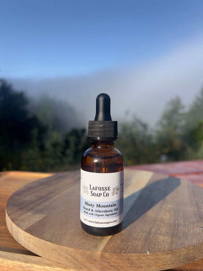 Bottle of Misty Mountain Beard & Aftershave Oil with natural ingredients for hydration and soothing post-shave care