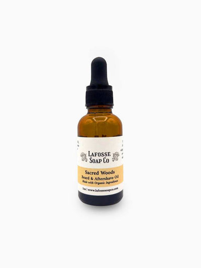 Bottle of Sacred Woods Beard & Aftershave Oil with natural ingredients for moisturizing and soothing skin