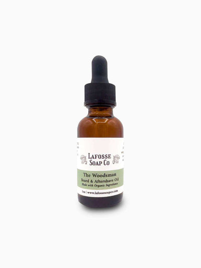 The Woodsman Beard & Aftershave Oil bottle with natural ingredients for hydrating and soothing post-shave skin